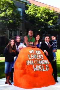 Students at Rock-Students gather at the Rock in front of Founder's Hall at the University of La Verne. February 15, 2013.